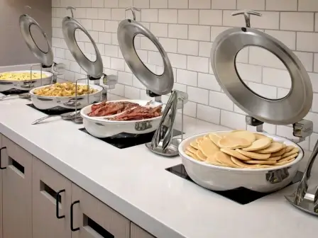 breakfast buffet with bacon, pancakes and eggs at hyatt house irvine