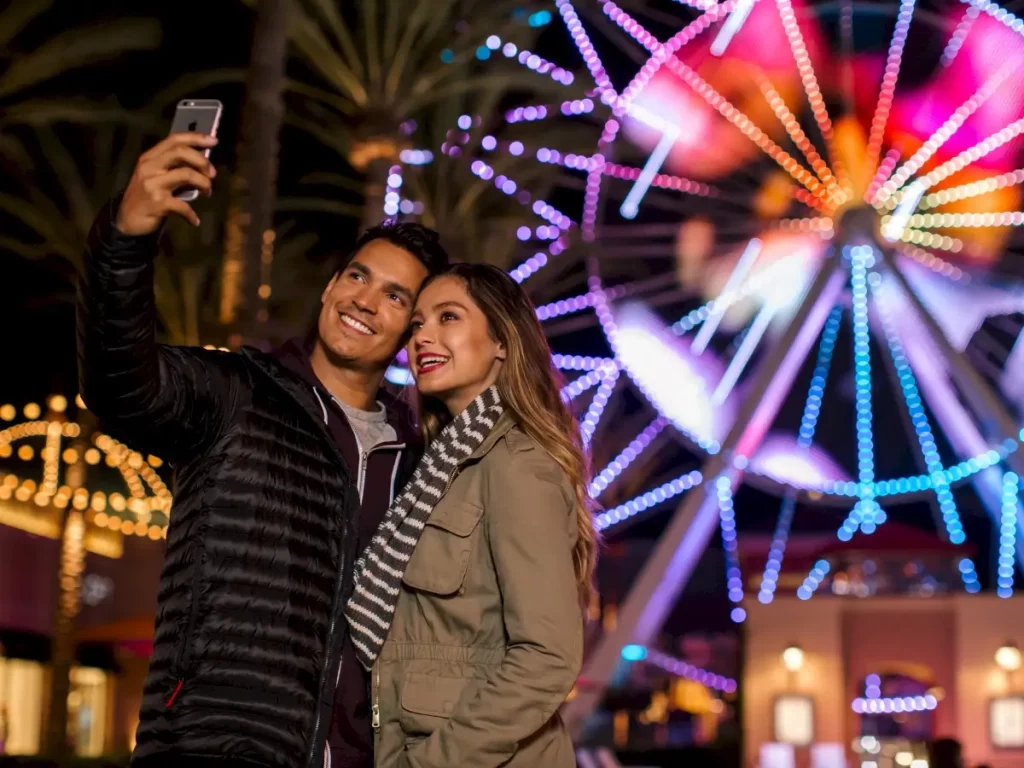 couple at the spectrum taking selfie