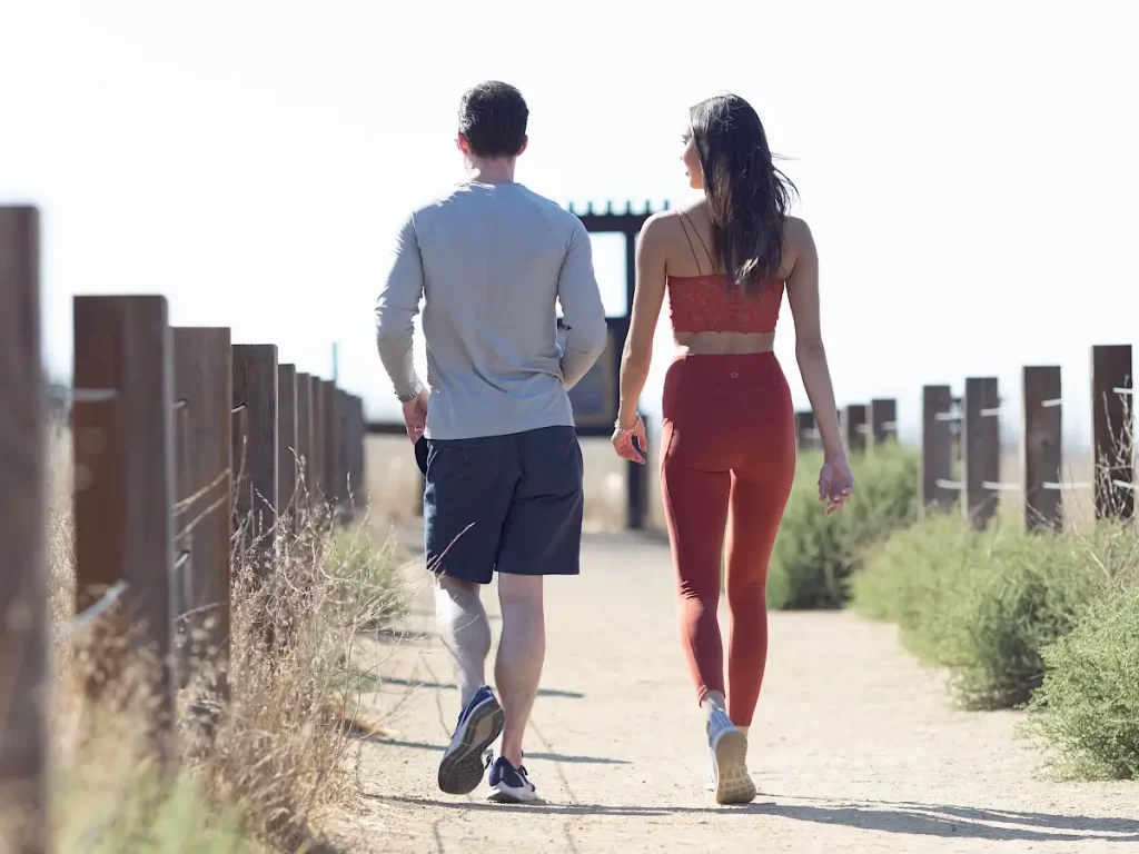 A couple walking outdoors in irvine