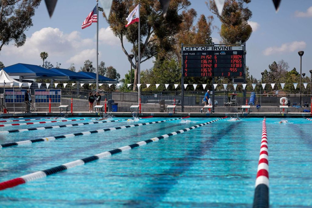 pool with american flag and scoreboard at woollett aquatic center
