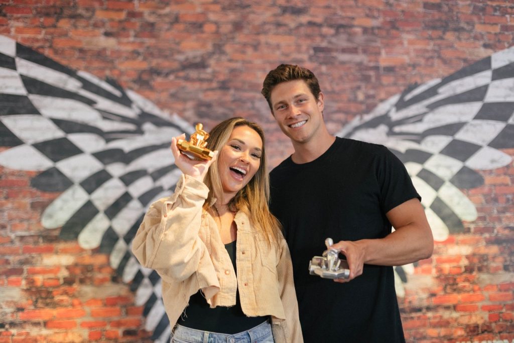 /a-couple-show-off-their-trophies-at-k1-speed.jpg