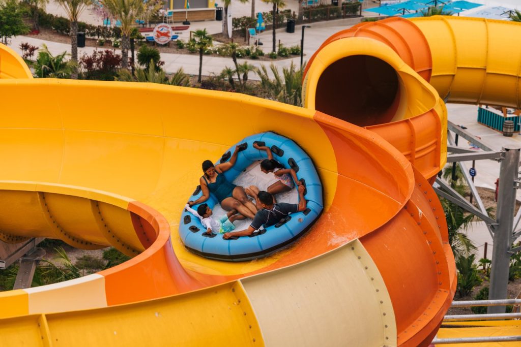 family at wild rivers slide