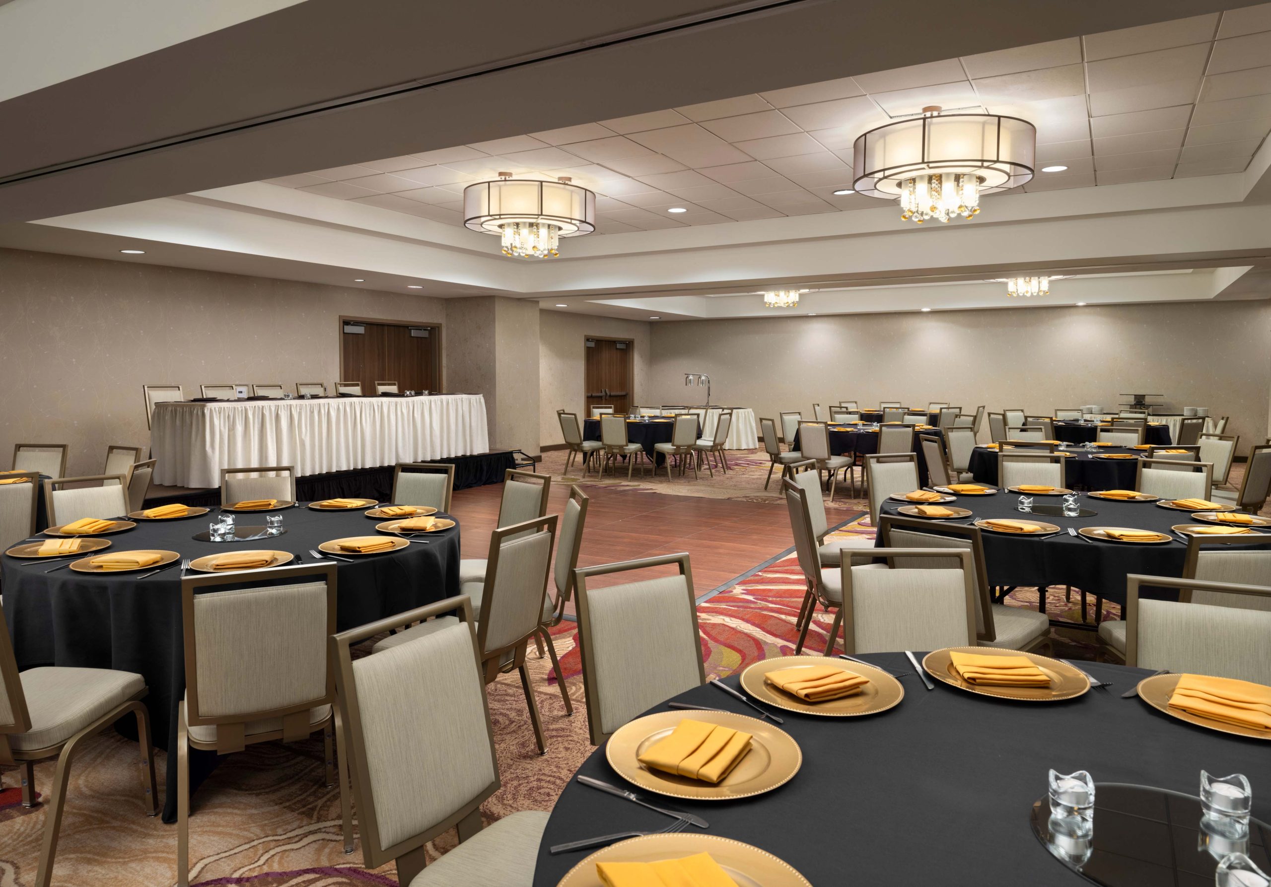 ballroom with chandelier, table with table setting at doubletree irvine spectrum
