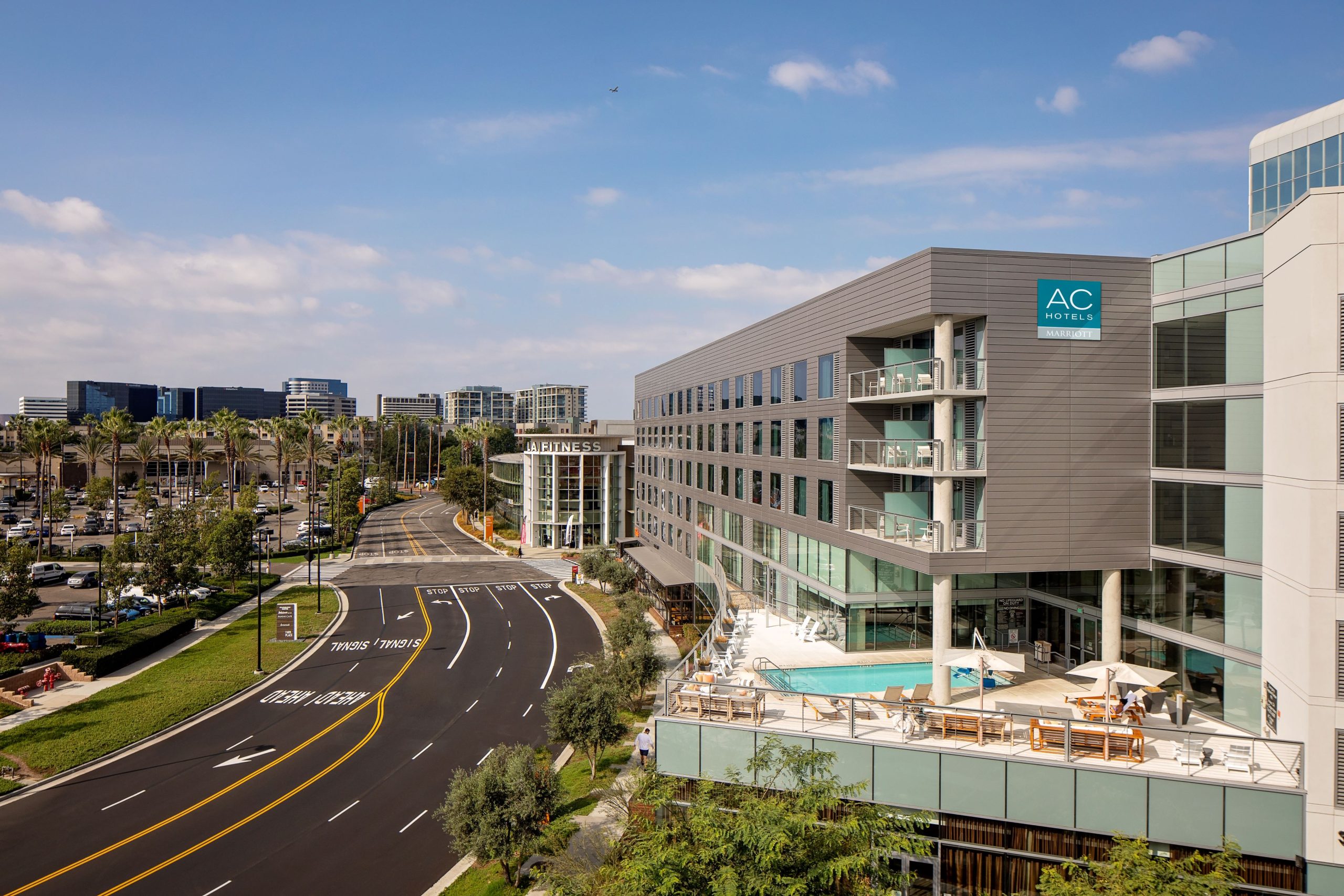 AC Hotel Irvine 1 view of ac hotel showing street, pool and building