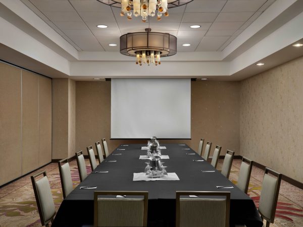 meeting room at doubletree irvine spectrum with long table and chairs