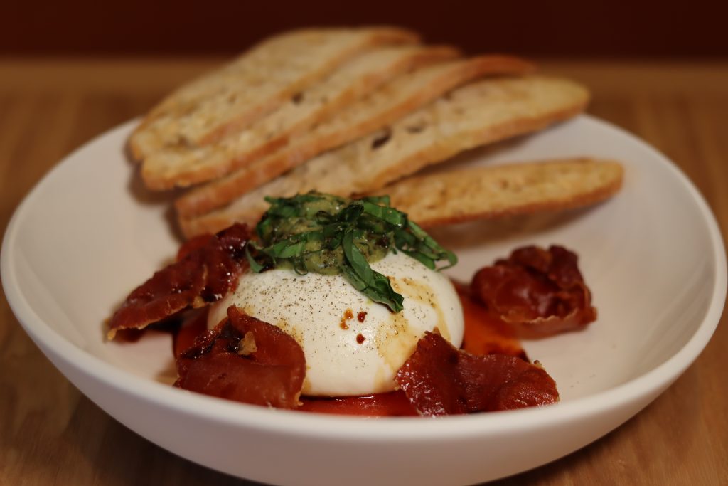 bowl of bread and cheese with tomatoes from monaco italian kitchen