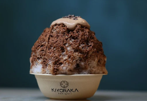 Japanese shaved ice dessert with brown toppings