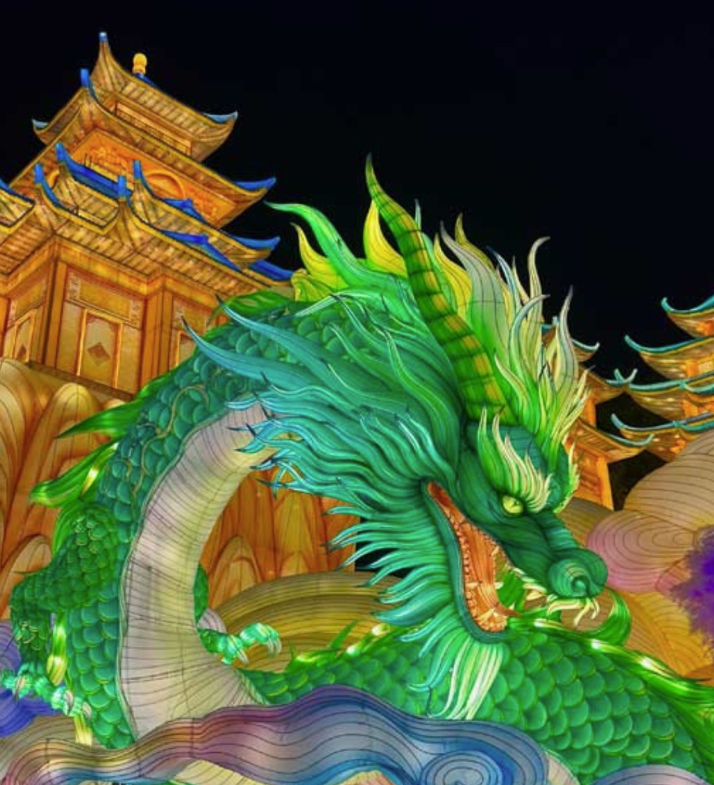 A Jolly Irvine Holiday 3 light up dragon display at dream glow festival