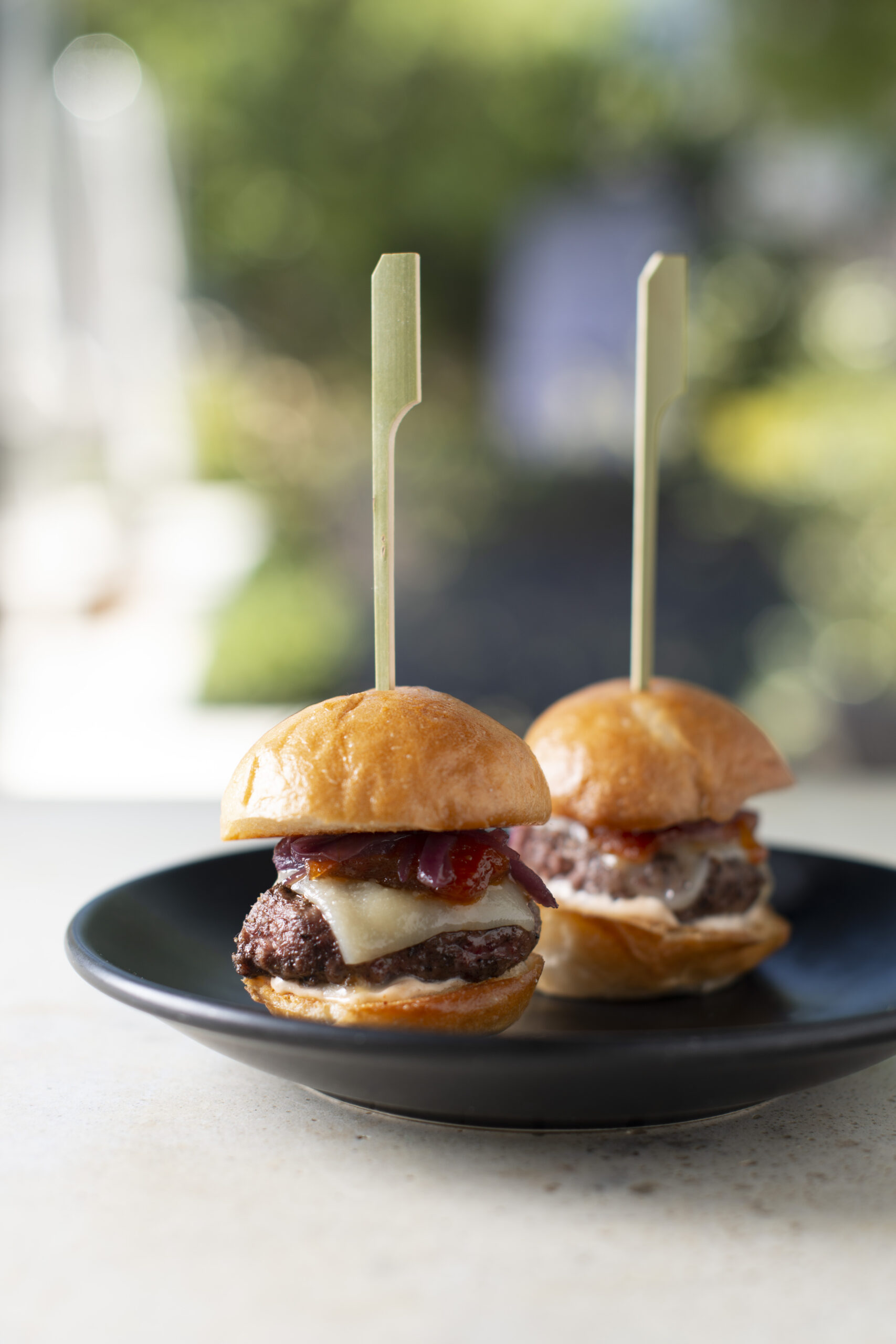 two filet sliders on a plate