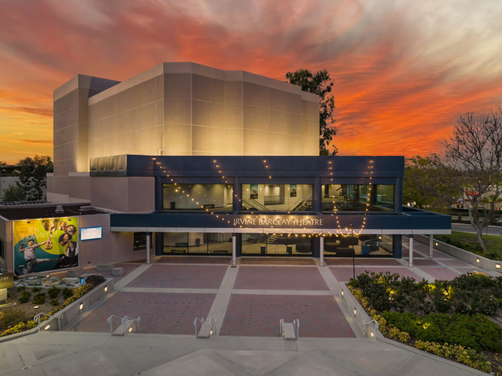 exterior building of irvine barclay theater at sunset