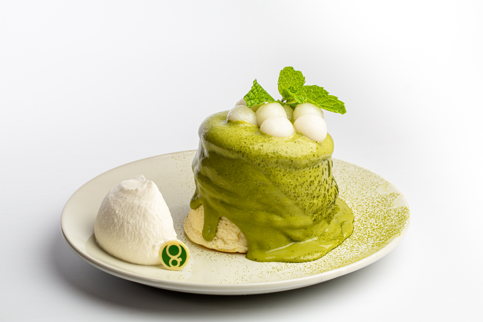 a plate of matcha Japanese souffle pancakes