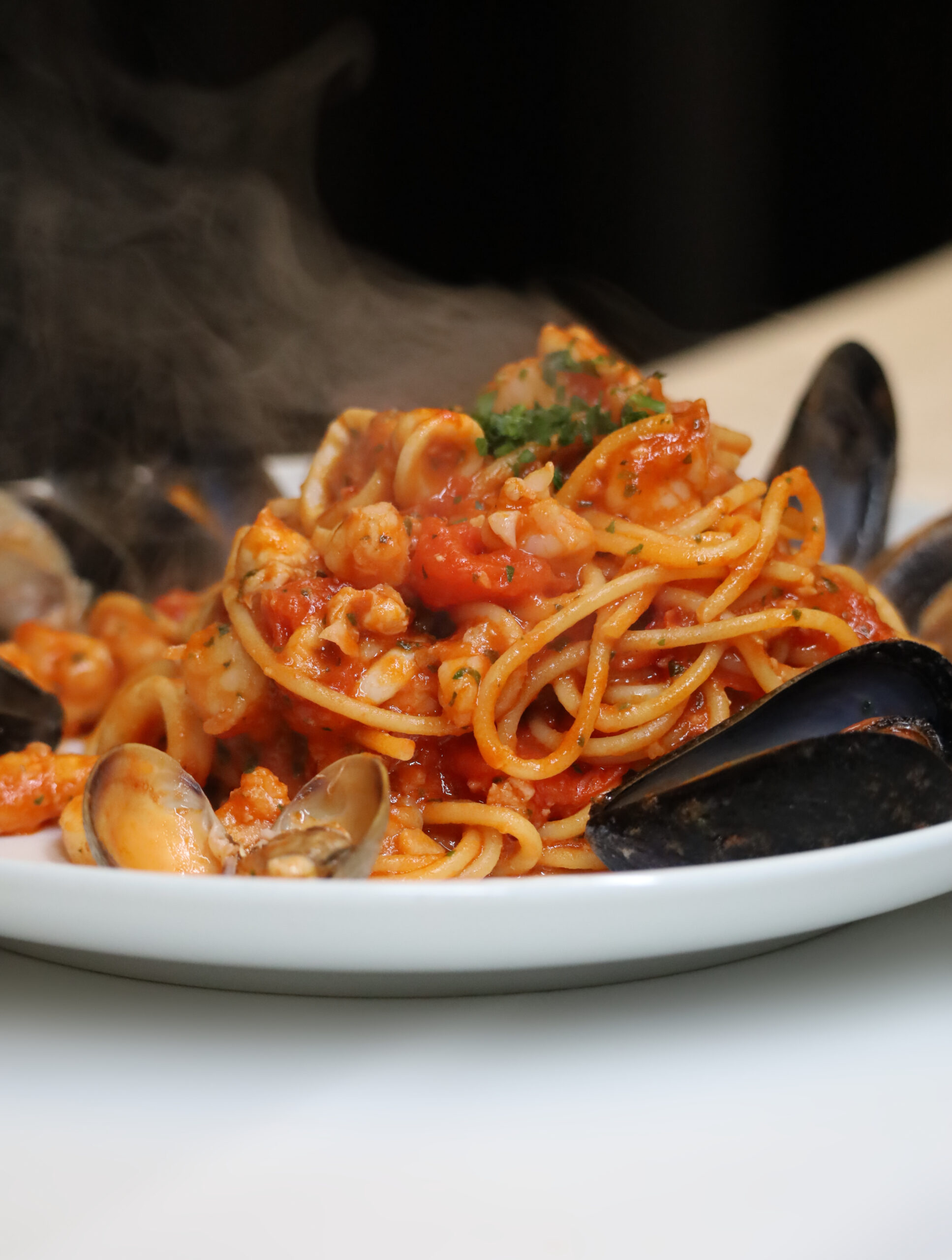 pasta with red sauce and clams
