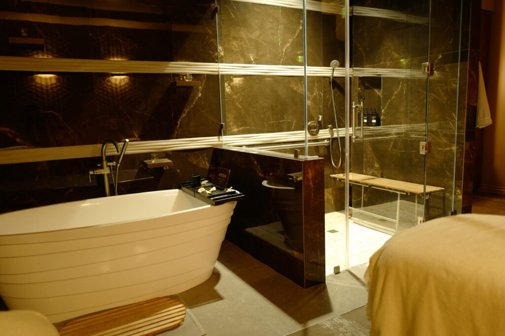 bath tub and shower in a private spa room