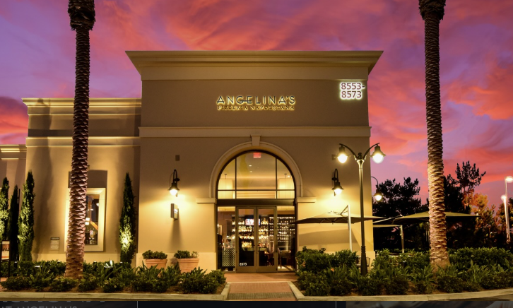 exterior building of Angelina's pizzeria during sunset