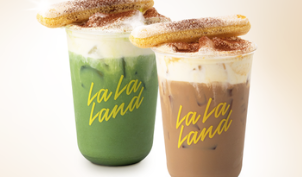 two la la land lattes with cookie on top
