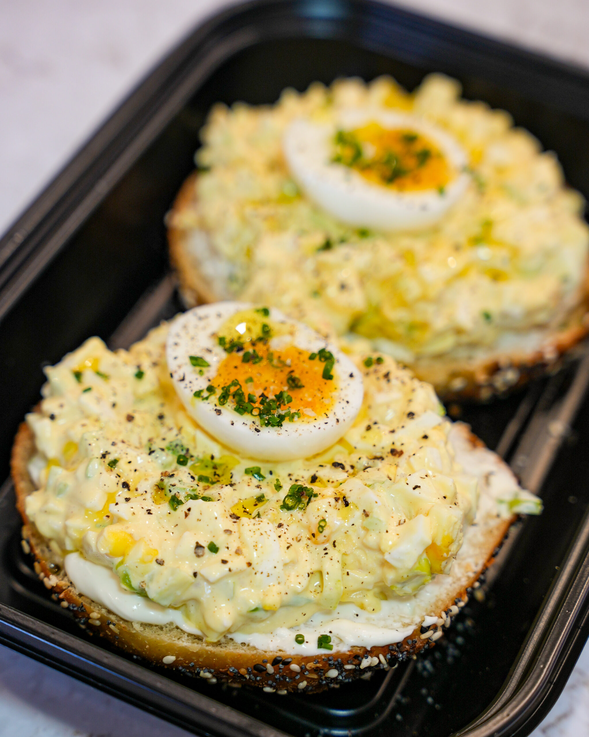 open face bagel with egg