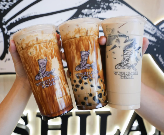 three glasses of boba drinks with text Wushiland Boba in front