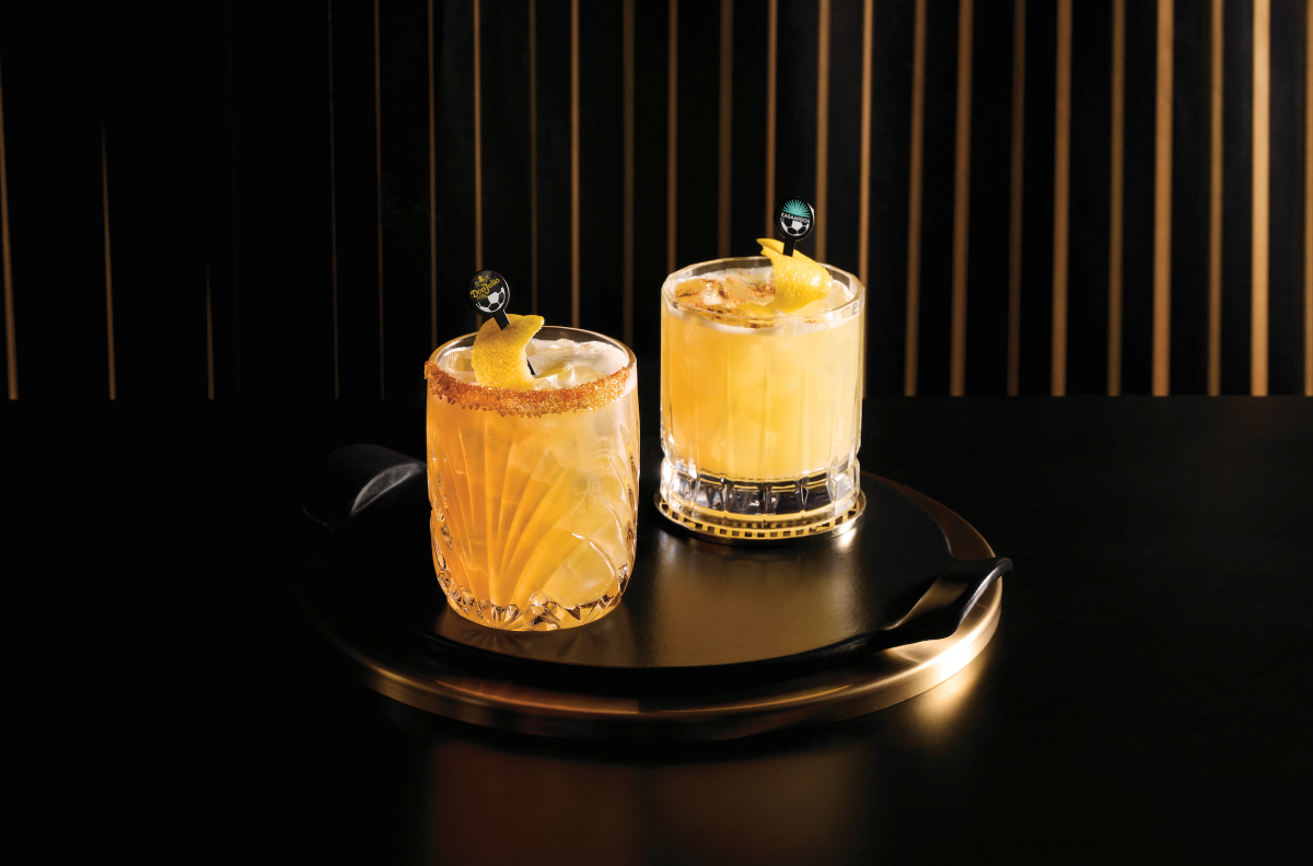 two golden cocktails